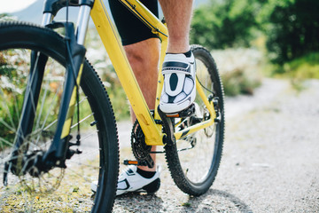 Closeup of a man wearing cycling shoes