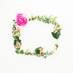 Floral frame with pink flower, hypericum and eucalyptus branches on white background. Flat lay, top view