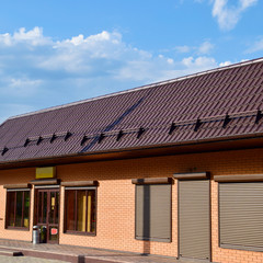 The roof of corrugated sheet on a building