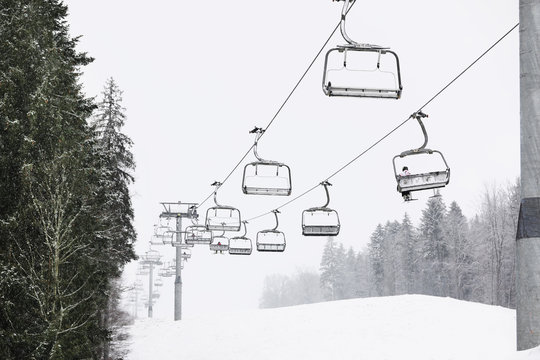 Ski lift at mountain resort. Winter vacation