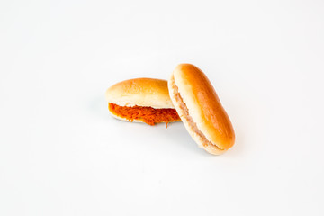 small hot dogs with onion on white background