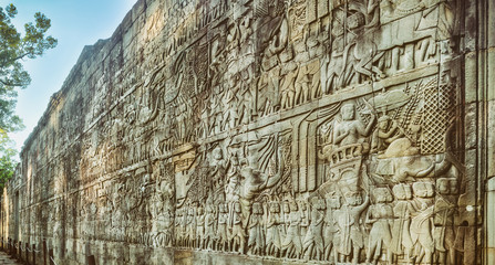 Bas-relief at  Bayon temple in Angkor Thom. Siem Reap. Cambodia. Panorama