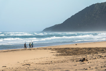 Beach of St. Lucia with fishermen, South Africa
