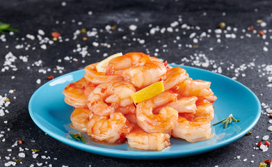 Shrimp cocktail background with close - up view of a group of fresh delicious chilled crustaceans as exquisite seafood for a party or dinner at a restaurant serving dishes from the sea.