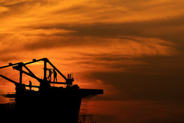 oil rig at sunset