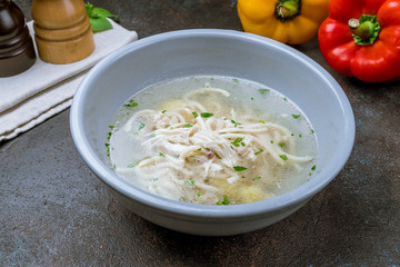 Chicken soup bouillon in a plate