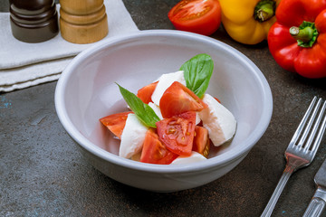 Caprese salad with mozzarella and tomato