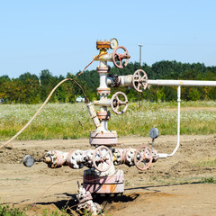 Well for oil and gas production. Oil well wellhead equipment. Oi