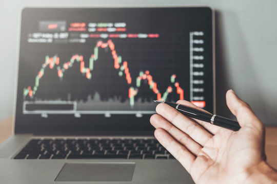 Business man Investment Entrepreneur Trading discussing and analysis graph stock market trading,stock chart concept