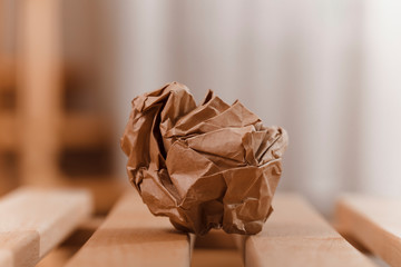 Paper ball on table