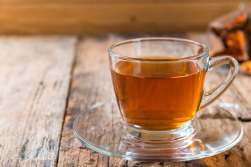 Bael tea juice on wooden table , healthy drink