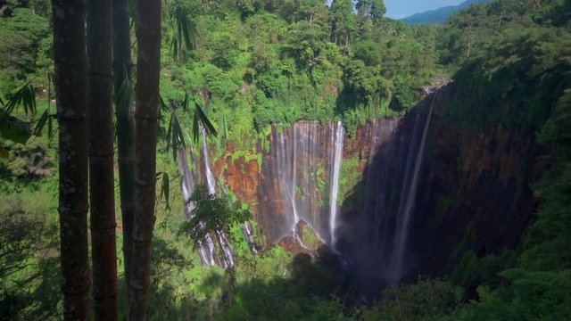 Beautiful view of Tumpak Sewu waterfalls also known as Coban Sewu at Lumajang, East Java, Indonesia. Shot in 4k resolution