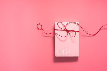 Be mine, Valentine Day concept, Love daily with red hearts on pink background