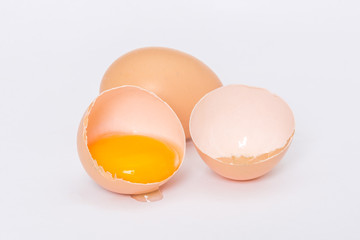 Broken egg on a white background