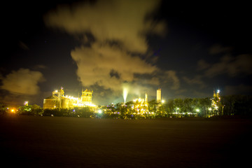 oil refinery at night