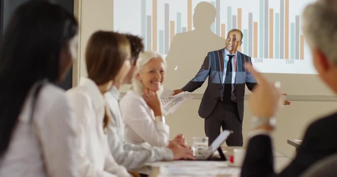 4k, Group of businesspeople clapping hands after a successful boardroom meeting. Slow motion