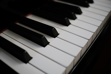 Piano keyboard background with selective focus.