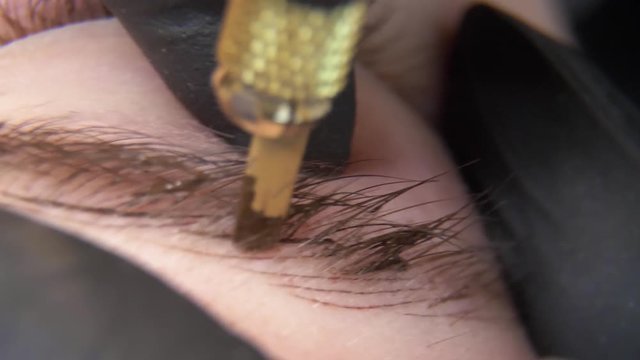 Permanent makeup. Permanent tattooing of eyebrows.
