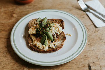 Eggs and veggies on a toast