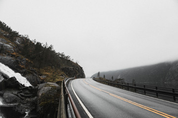 View of highway road in a misty mountain