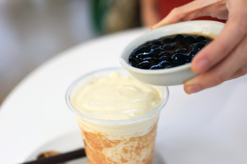 Bubble tea with ice creamy caramel tea. Milk bubble tea Taiwan milk tea beverage.