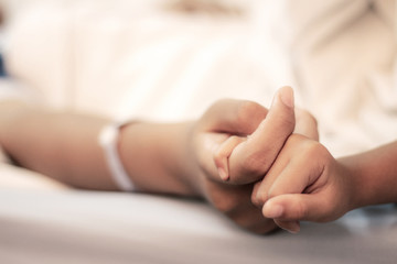 hands of patients and visiting.