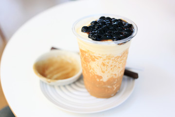 Bubble tea with ice creamy caramel tea. Milk bubble tea Taiwan milk tea beverage.
