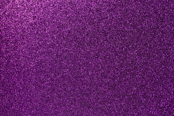 Macro abstract background of sparkling purple glitter