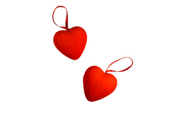 Two red hearts isolated on a white background