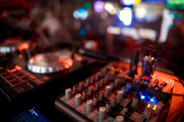 Fototapeta na wymiar DJ console at the nightclub. Nightlife