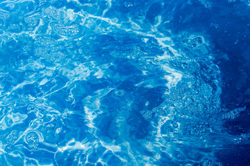 background image of water, blue water, bubbles, waves, stains  