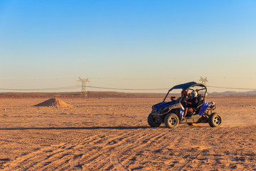 Safari trip through egyptian desert driving buggy cars