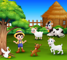 A farmer at his farm with a bunch of farm animals