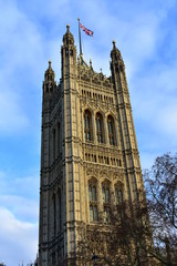 Victoria Tower with the flag of Great Britain. City of Westminster, Houses of Parliament. London, United Kingdom.
