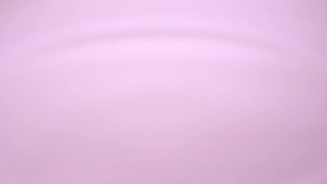 もも色の水滴と波紋   スローモーション（1/4倍速）