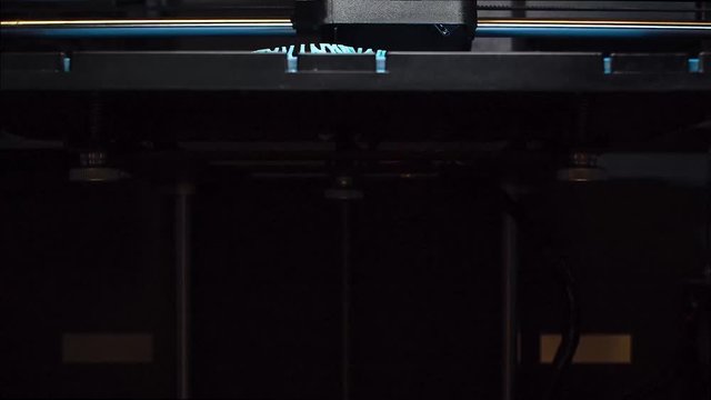 3d printer prints the model of female body, process of creating a bust of girl on 3d printer. Accelerated video.