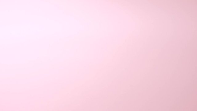 もも色の水滴と波紋   スローモーション（1/4倍速）