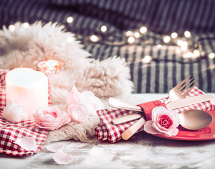 Valentine's Day festive dinner on a wooden background cutlery