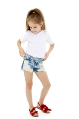 Little girl in a pure white t-shirt for advertising and shorts.