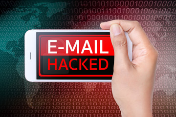 Hand held a smart phone with a screen showing that the email was hacked.