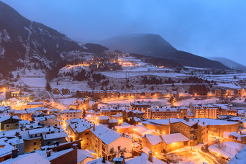 Snowy sunrise in the town of Canillo, Andorra. Cityscape  in Winter. - obrazy, fototapety, plakaty