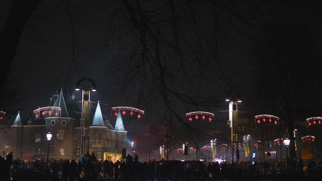 Festive fireworks on the Neumarkt square in Amsterdam. The first of January 2019.