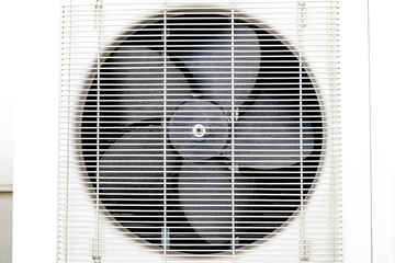 Fan Condenser unit coil fan of air conditioner close up.