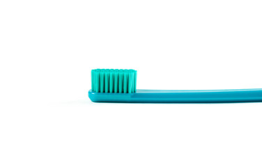 Beautiful blue toothbrush. Close up. Isolated on white background