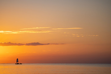 (石垣島)夕焼けの海と船