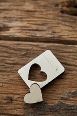 Wood heart Valentine on wooden