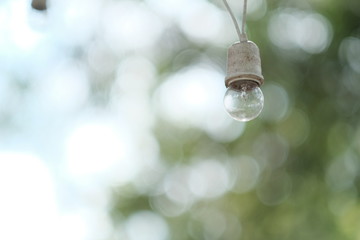 Closed up old lamp on green background 