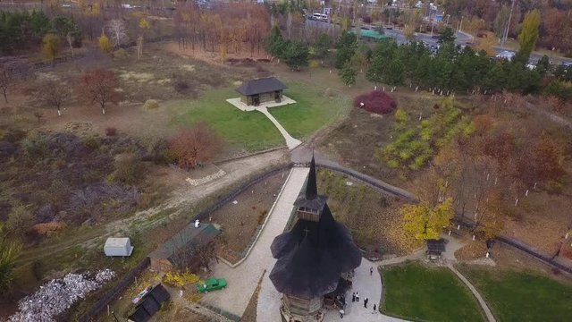 Flight over old wooden church at the periphery of Kishinev city, Moldova republic.