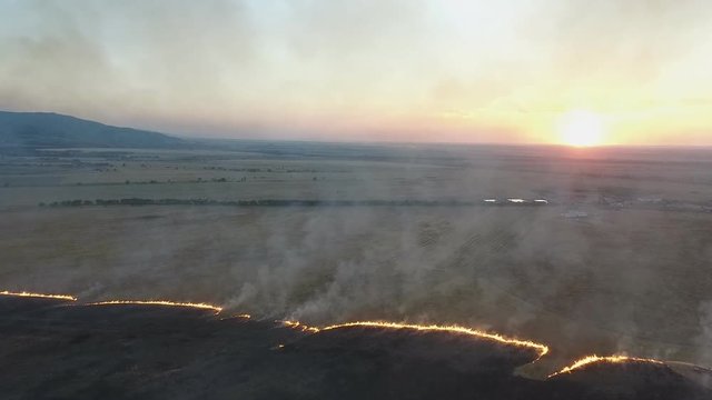 Fire on the field. Video from the air.