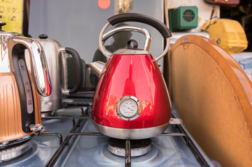 Vintage stylised electric kettles for sale at street market